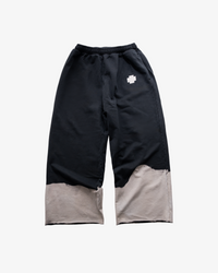 ASYMMETRICAL SWEATPANTS - BLACK / CREAM